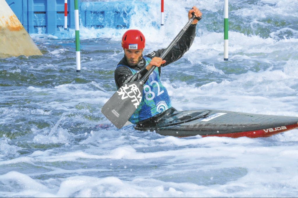 riversport okc kayaker navigating rapids reflecting aubrey k. mcclendon outdoor recreation vision