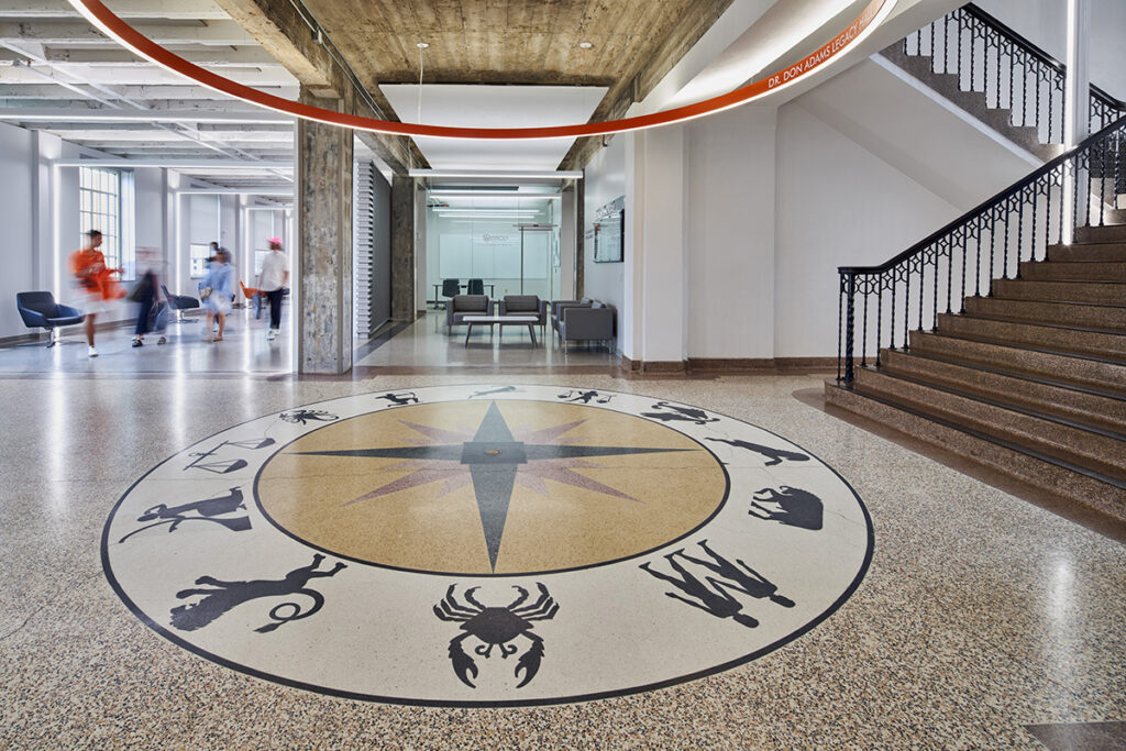 The historic compass terrazzo floor in the lobby of OSU’s Engineering South, featuring zodiac symbols and original architectural details.