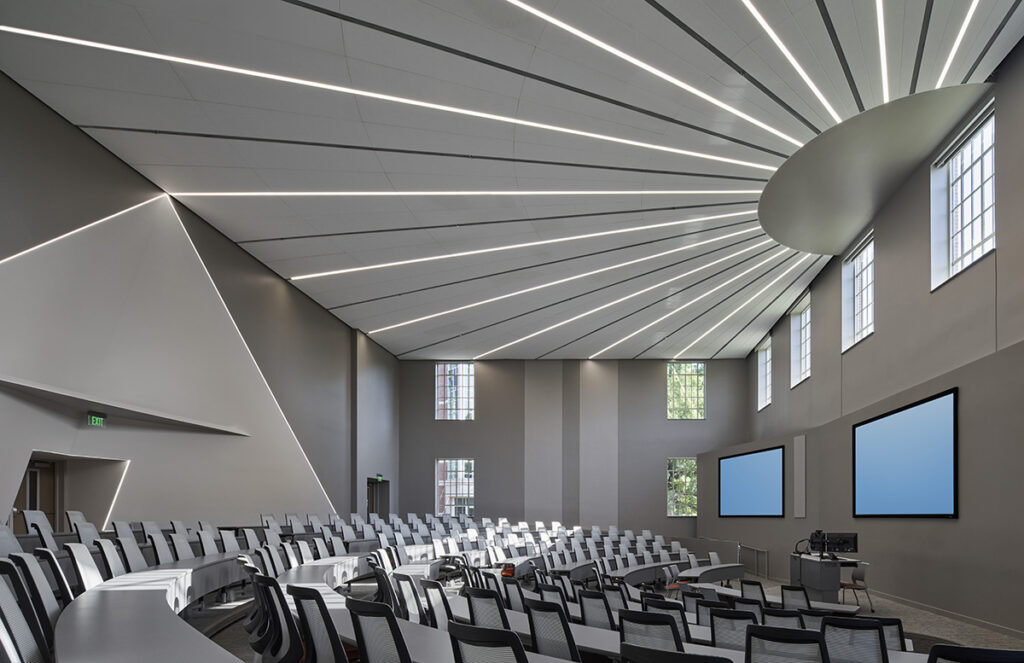 OSU’s College of Engineering, Architecture and Technology 300-seat auditorium featuring bold geometric design and natural lighting.